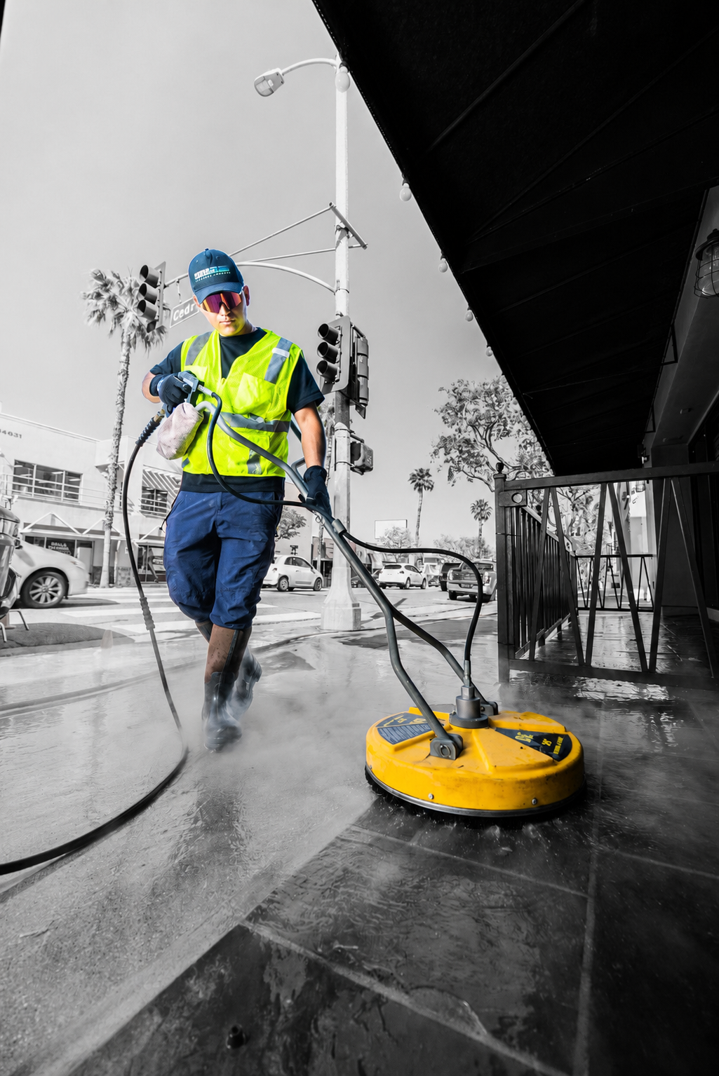 Man Using BE Pressure Washer Surface Cleaner to Clean Sidewalk