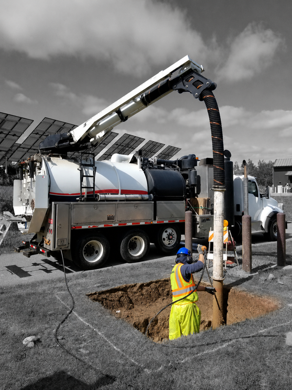 Color Pop Image of Man Operating Hydro Vac Truck
