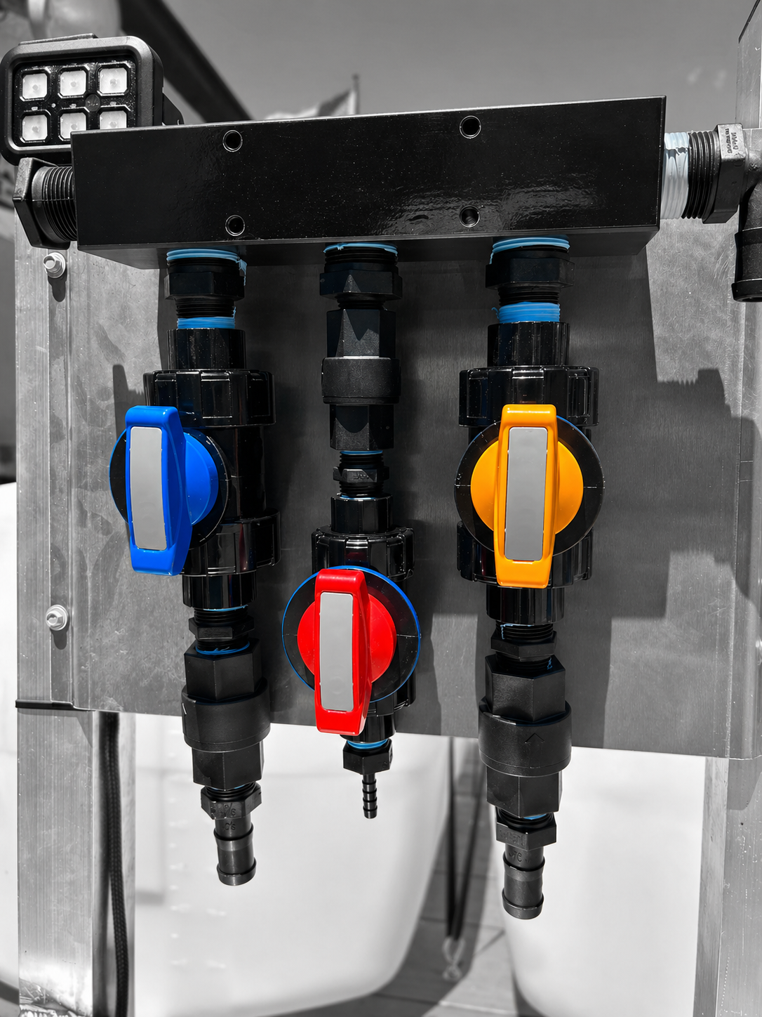 Three soft wash valve handles for a chemical proportioner. 